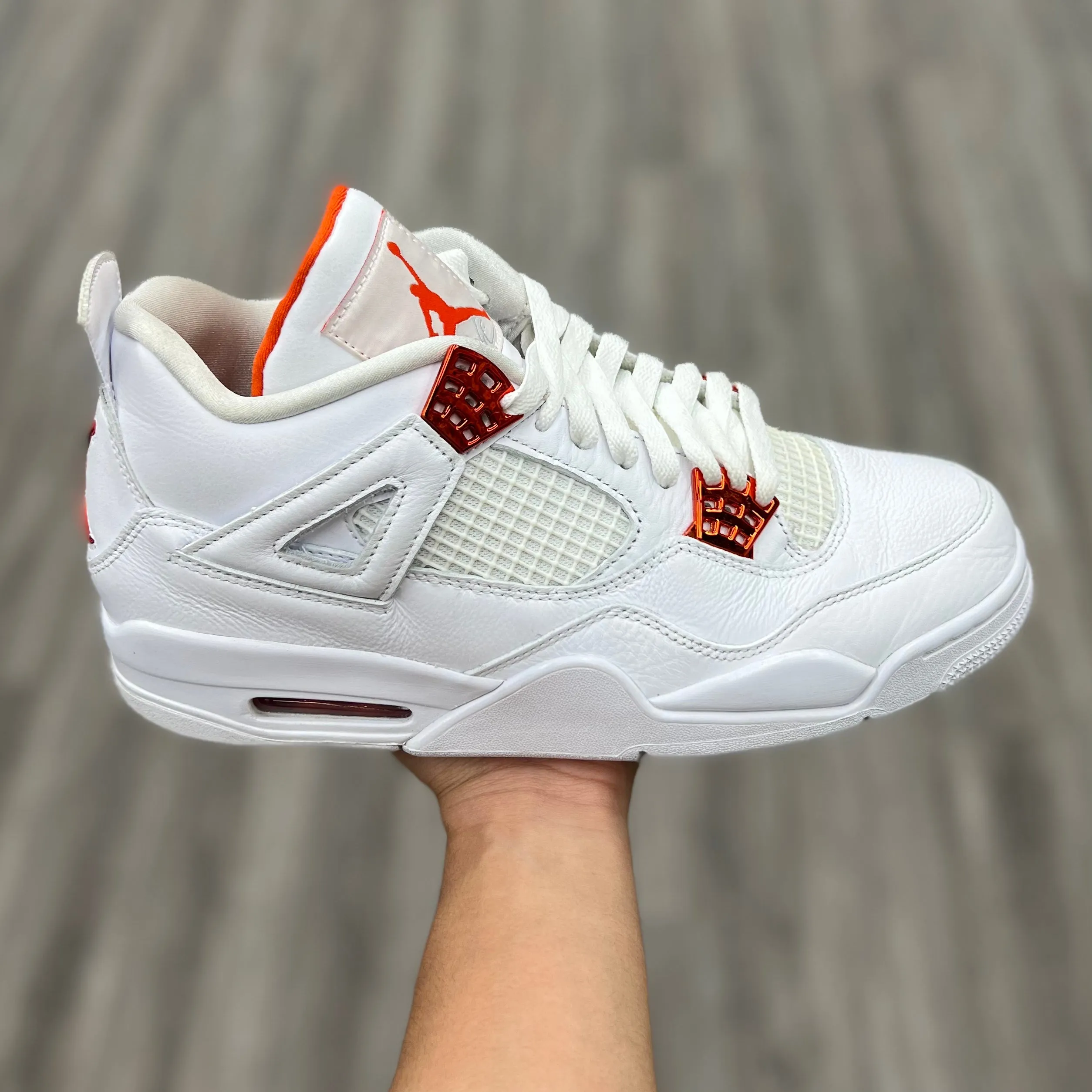Air Jordan 4 Retro “ Metallic Orange”