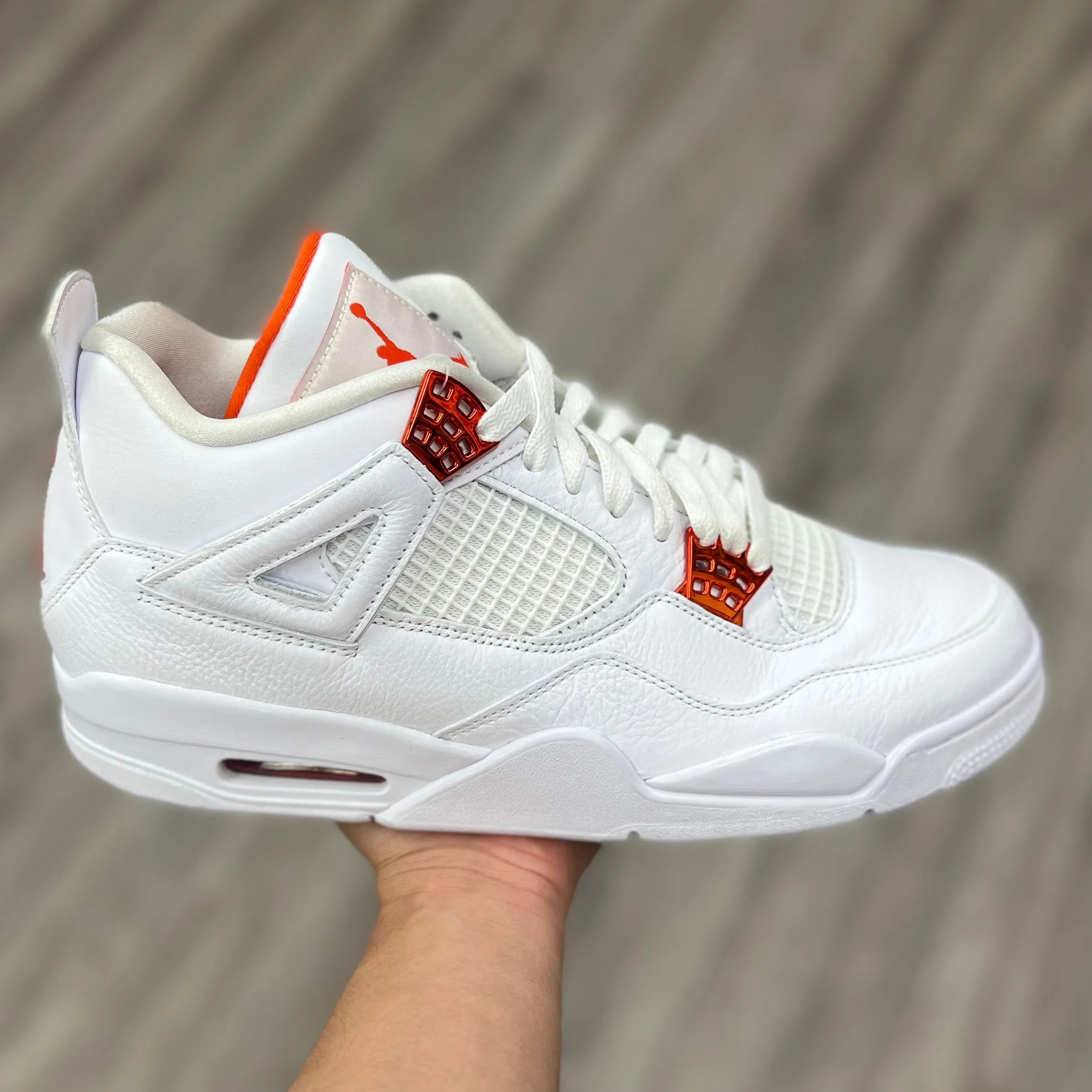 Air Jordan 4 Retro “ Metallic Orange”