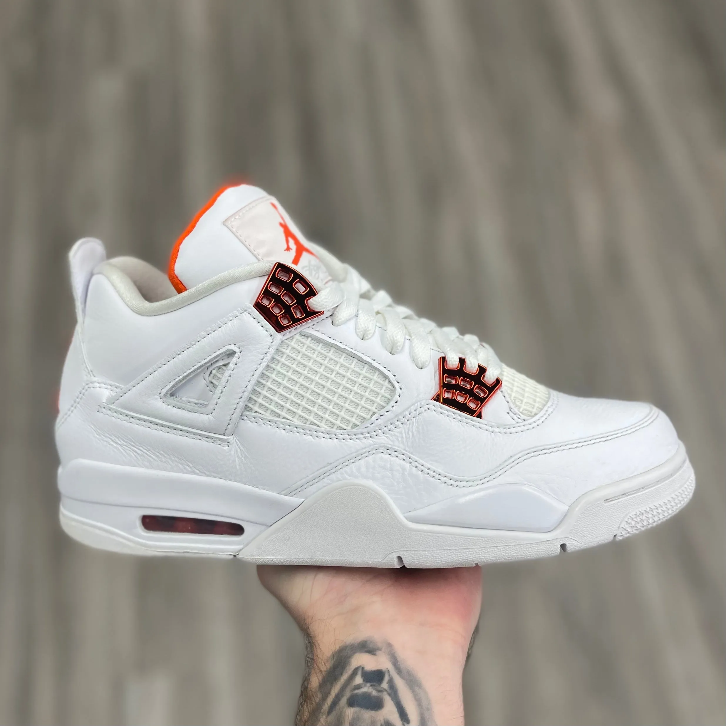 Air Jordan 4 Retro “ Metallic Orange”