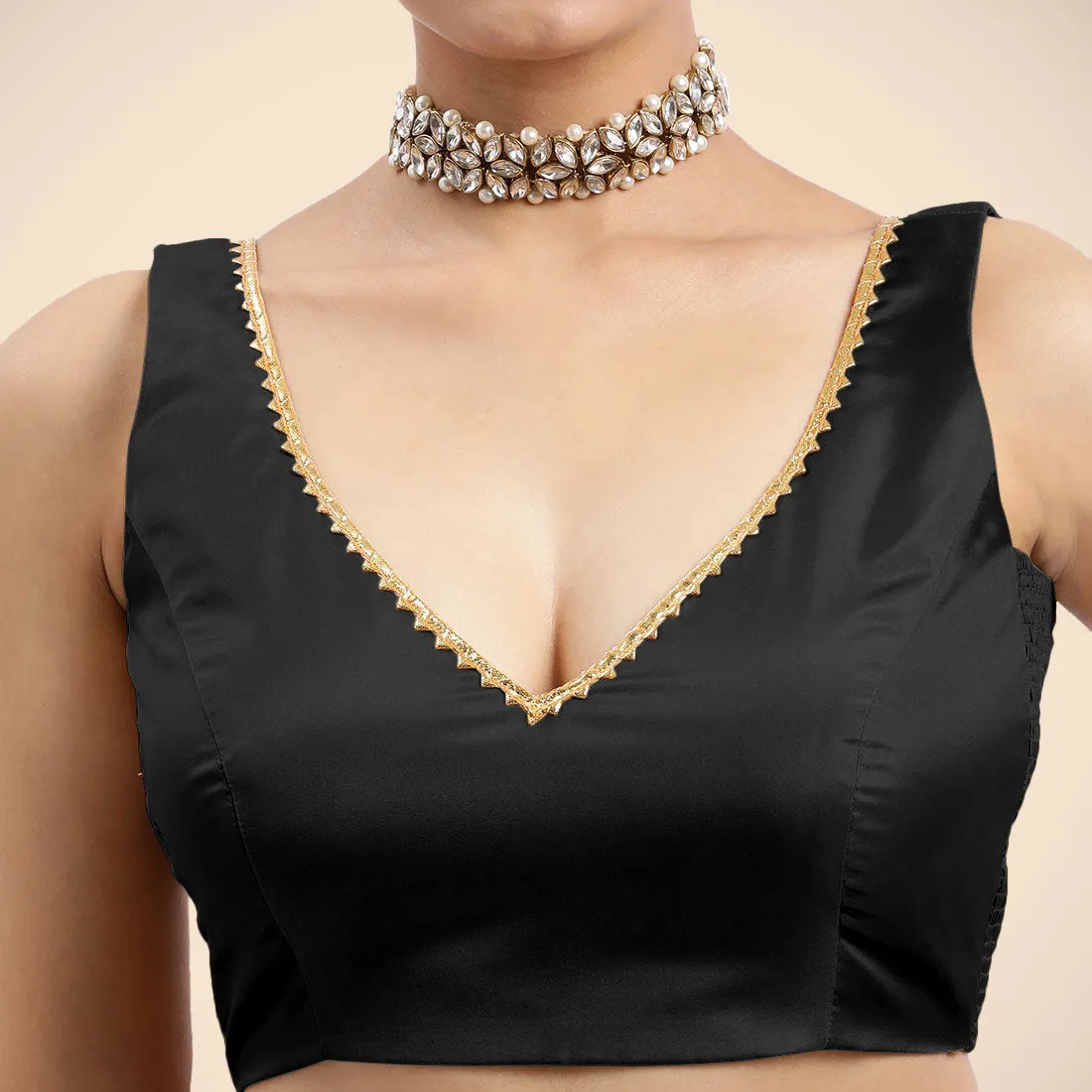Raisa x Tyohaar | Charcoal Black Sleeveless FlexiFit™ Saree Blouse with V Neckline with Golden Gota Lace Embellishment and Back Cut-out with Tie-Up